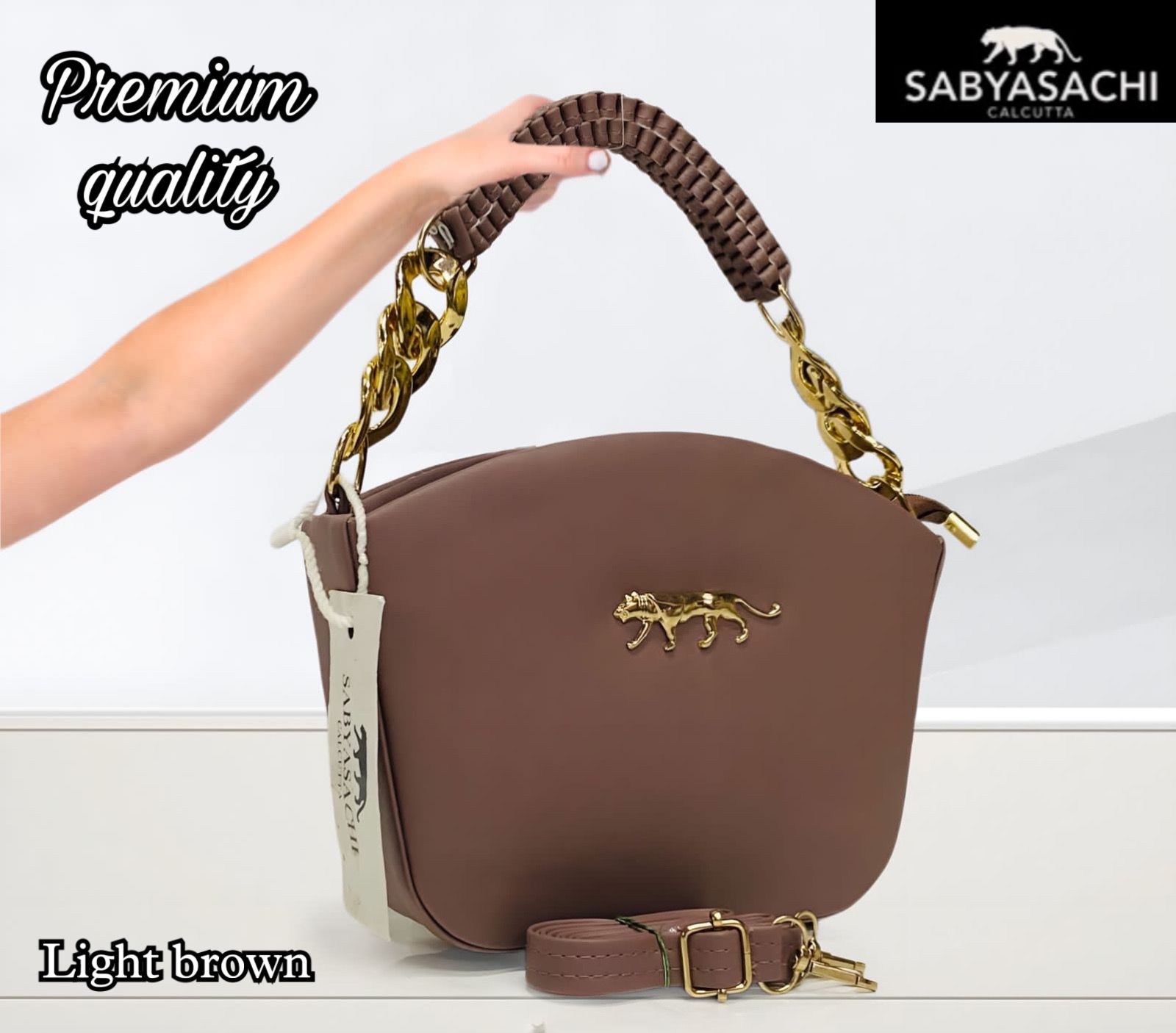 Regal Radiance: Sabyasachi Sling Bag with Weaved Handle